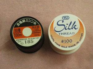 Left - 50 weight silk for hand or machine stitching Right - 100 weight silk for hand stitching