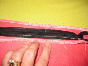 Line up the mark on the tape with the seam line and pin in place.